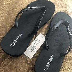 Calvin Klein flip flops. Brand new women’s size